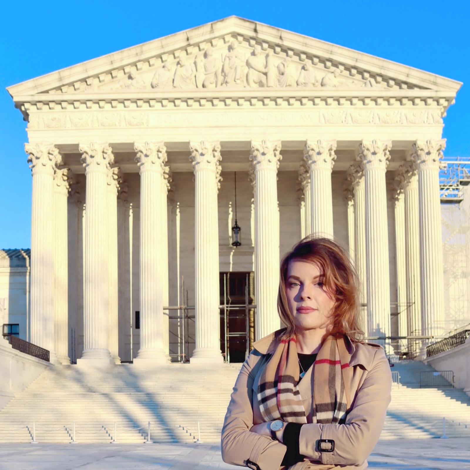 Danni Askini standing in front of the U.S. Supreme Court, arms crossed